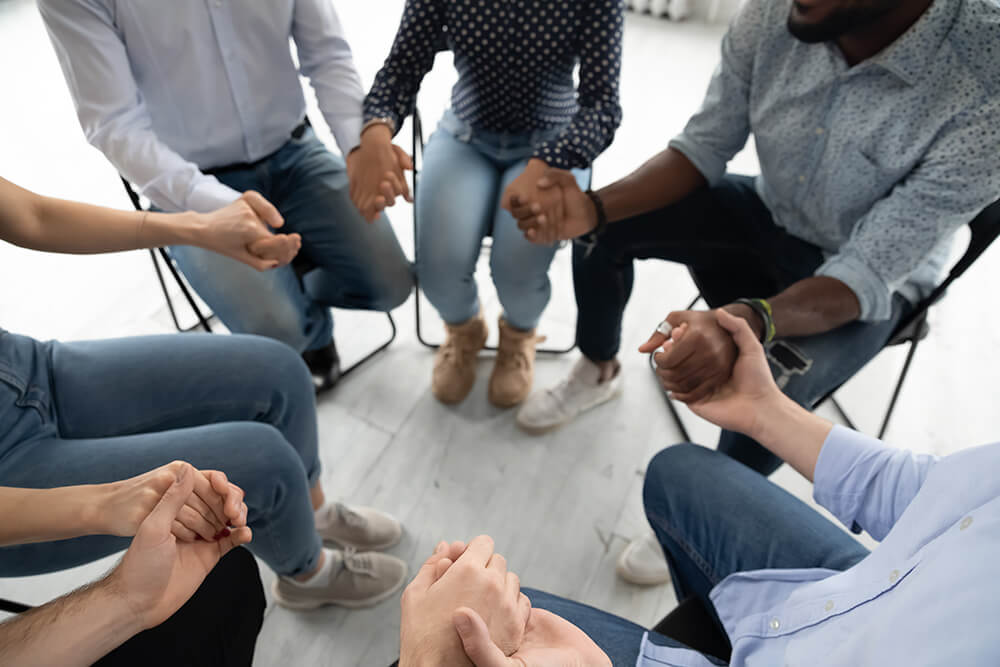 People holding hands image